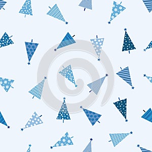 Seamless Christmas pattern with Christmas trees on light blue ba