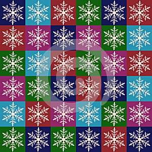 Seamless Christmas pattern consisting of bright multi-colored squares with diy cut paper snowflake in middle of each of