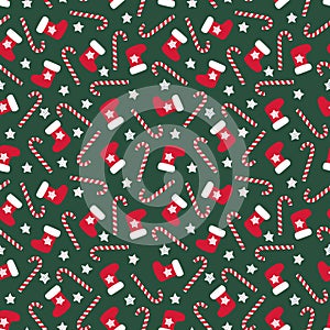 Seamless Christmas pattern with xmas stocking, stars and candy canes.