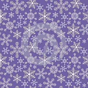 Seamless christmas texture with snowflakes on a blue background