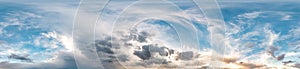 Seamless cloudy blue sky hdri panorama 360 degrees angle view with zenith and beautiful clouds for use in 3d graphics as sky dome