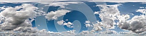 Seamless cloudy blue sky hdri panorama 360 degrees angle view with zenith and beautiful clouds for use in 3d graphics as sky dome photo