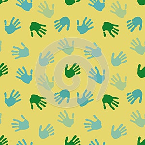 Seamless coloured handprint pattern for fabrics and packaging and gifts and cards and linens and kids and wrapping paper