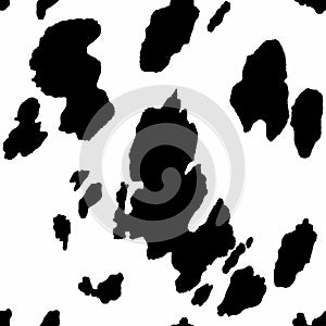 Seamless cow pattern with black spots on a white background. Vector animal print textured pattern