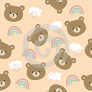 Seamless cute pattern with teddy bear and rainbow. Seamless pattern with a bear face and clouds.