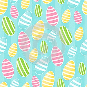 Seamless endless blue background with Easter eggs of different sizes