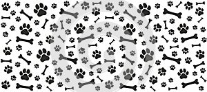 Seamless endless pattern of traces of dog paws. Dog legs and bones photo