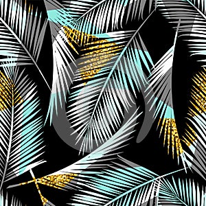Seamless exotic pattern with palm leaf silhouettes. Gold glitter texture.