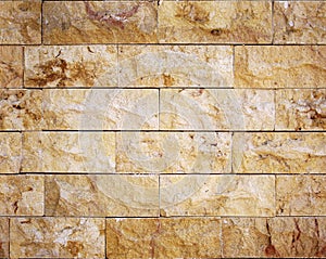 Seamless facing stone texture.