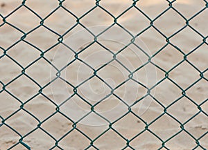 Seamless fence chain on sand background