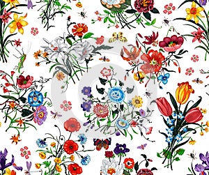 Seamless floral pattern with bright colorful flowers with leaves on a white background. The elegant template for fashion prints. M