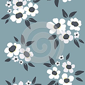 Seamless floral pattern, cute ditsy in folk style: bouquets with white flowers on a blue background. Vector.