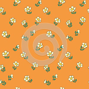 Seamless floral pattern, cute flower print in a retro motif, small daisy flowers on an orange background. Vector ditsy design.
