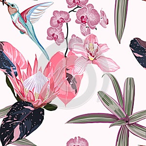 Seamless floral pattern with many kind of pink flowers and exotic tropical leaves on white background.