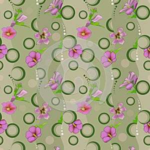 Seamless floral pattern with purple exotic flowers on a green background.