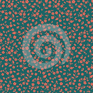 Seamless floral vector pattern orange pinkish small flowers on dark green background, ditzy, millefleurs, fabric photo