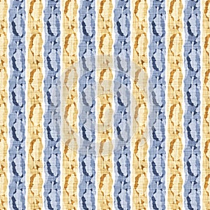 Seamless French country kitchen stripe fabric pattern print. Blue yellow white vertical striped background. Batik dye