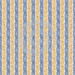 Seamless French country kitchen stripe fabric pattern print. Blue yellow white vertical striped background. Batik dye