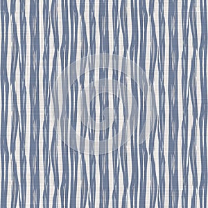 Seamless French country kitchen stripe fabric pattern print. Blue yellow white vertical striped background. Batik dye