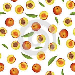 Seamless fruit pattern. Peaches and halves with green leaves isolated on white