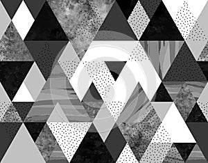 Seamless geometric abstract pattern with black, spotted and gray watercolor triangles on white background photo