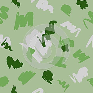 Seamless geometric pattern with abstract brush strokes on green background.