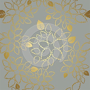 Seamless golden lace leaves pattern on grey background