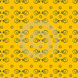 Seamless graphic Halloween ornamental pattern with black swirl decorative elements on yellow background. Elegant holiday print