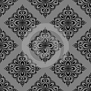 seamless graphic pattern, floral black ornament tile on gray background, texture