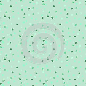 Seamless green ink dots pattern. Vector grunge background. Vector illustration.