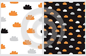 Seamless Hand Drawn Baby Shower Vector Pattern with Fluffy Orange and Gray Clouds.