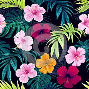 Seamless hand drawn tropical vector pattern with bright hibiscus flowers and exotic palm leaves on dark background.