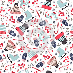 Seamless hand drawn winter pattern with knitted hats, socks and