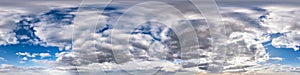 Seamless hdri panorama 360 degrees angle view blue sky with beautiful evening fluffy cumulus clouds without ground with zenith for