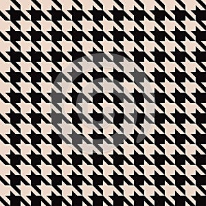 Seamless houndstooth pattern in black and beige. Vector textile background