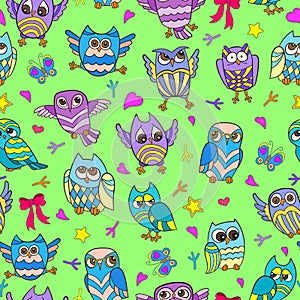 Seamless illustration with funny cartoon owls on a green background