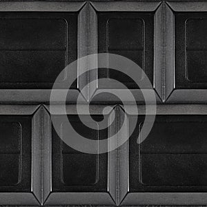 Seamless 4k photo texture material of black plastic tech tile panel surface