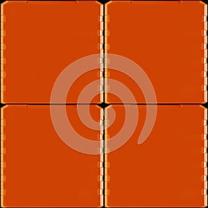 Seamless 4k photo texture material of orange and black plastic tech tile panel surface