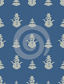 Seamless knitted pattern with Christmas trees and snowmen on a blue background