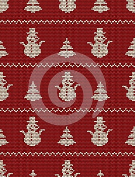 Seamless knitted pattern with Christmas trees and snowmen on a red background