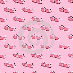 Seamless looping pattern with pink sunglasses on a bright background. hard shadows from the sun at noon. leisure, travel and