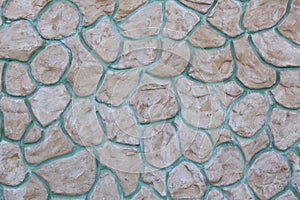 Seamless masonry wall with irregular shaped stones