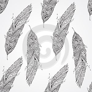 Seamless monochrome pattern with feathers