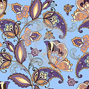 Seamless oriental floral pattern with butterflies. Ornament paisley on a blue background. Decorative ornament backdrop