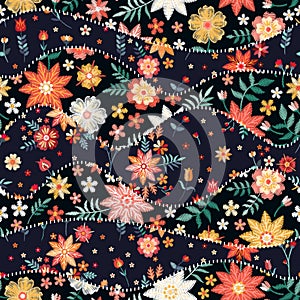 Seamless patchwork pattern of wavy patches with embroidery flowers. Beautiful needlework. Vector illustration