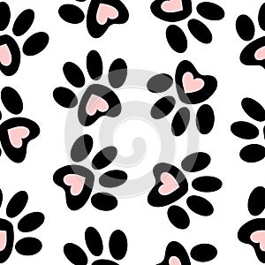 Seamless pattern of animal paws. Paw prints. Dog and cat puppy icon. Traces of a pet.