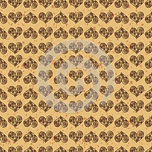 Seamless pattern background. Brown hearts on a gold ground. Fondness wallpaper. photo