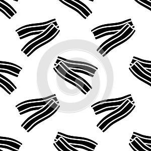 Seamless pattern with bacon. Slices of fried bacon