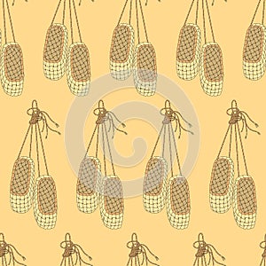 Seamless pattern with bast shoes