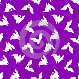 Seamless pattern of bats. White bats on a black background. Design for Halloween. vector illustration